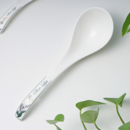American porcelain two curved spoon