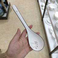 Bone china two curved spoon