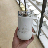 Bone china waist retracting cup